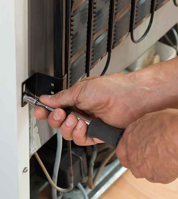 Refrigerator Being Repaired